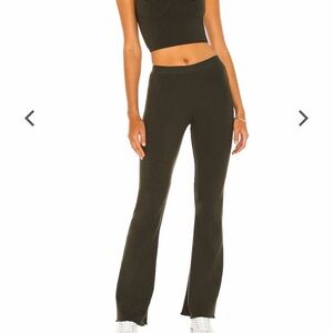 Indah mid rise stretch Flare Pants size small in forest green